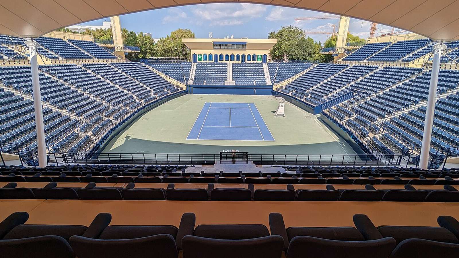 Panoramic view of Dubai Tennis Stadium from the south-side spectator stands