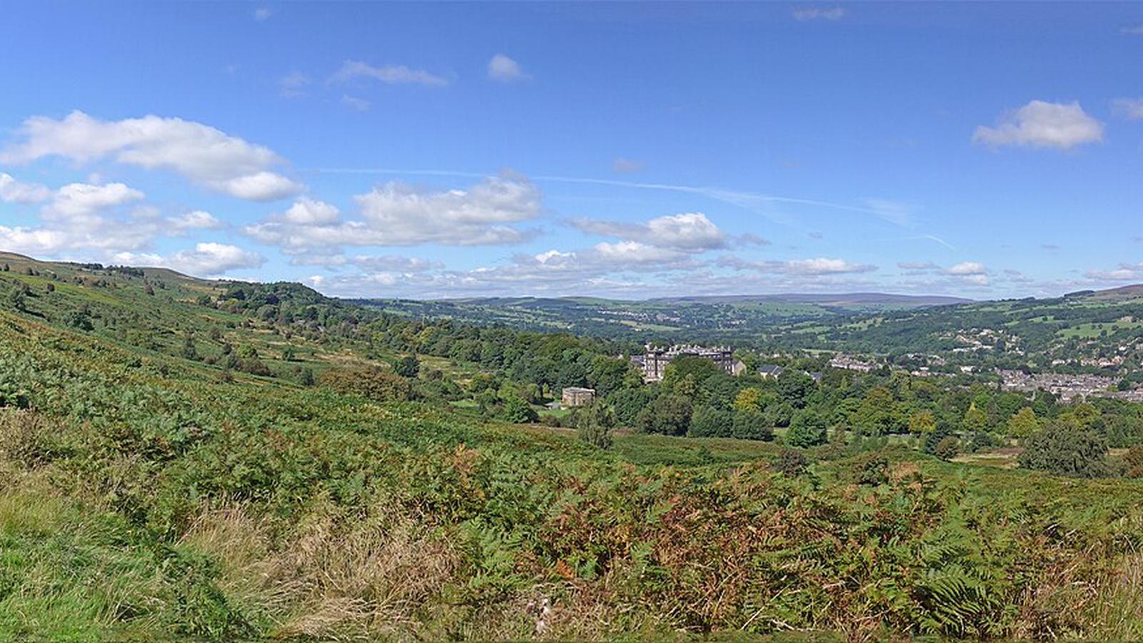 Ilkley and its surrounding hills viewed across moorland in August 2016.