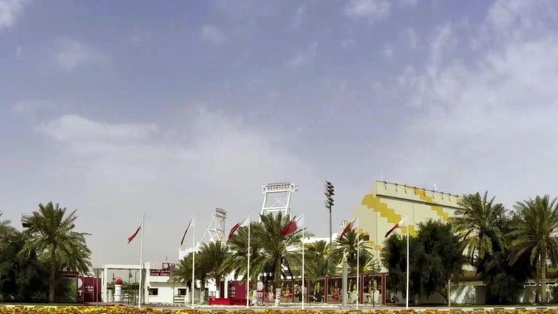 Palm trees and flowers outside the Khalifa Tennis and Squash Complex in Doha