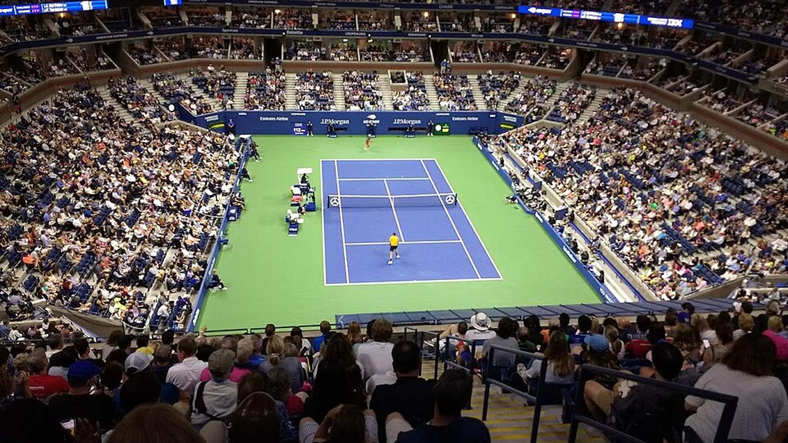 Court and spectator stands inside Arthur Ashe Stadium at the 2018 US Open.